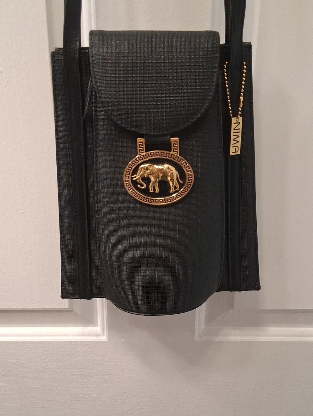 NIMA Black Crossbody Bag with Gold Elephant Medallion